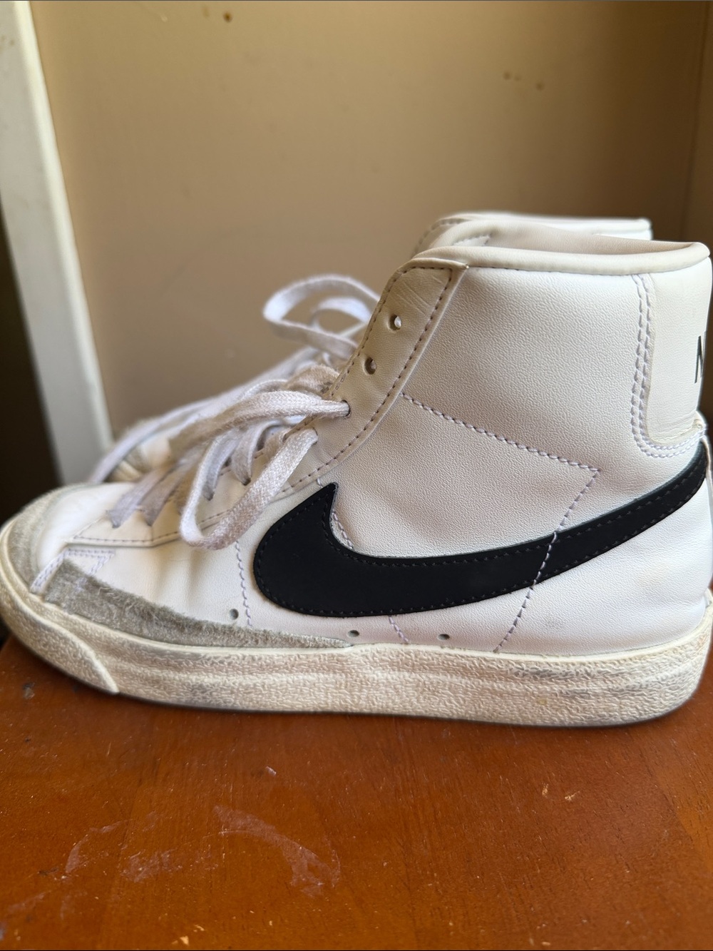 Nike Kids White High-Top Sneakers with Black Swoosh Accent